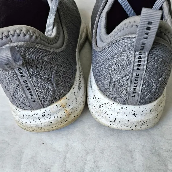 APL Phantom gray running shoes speckle soles