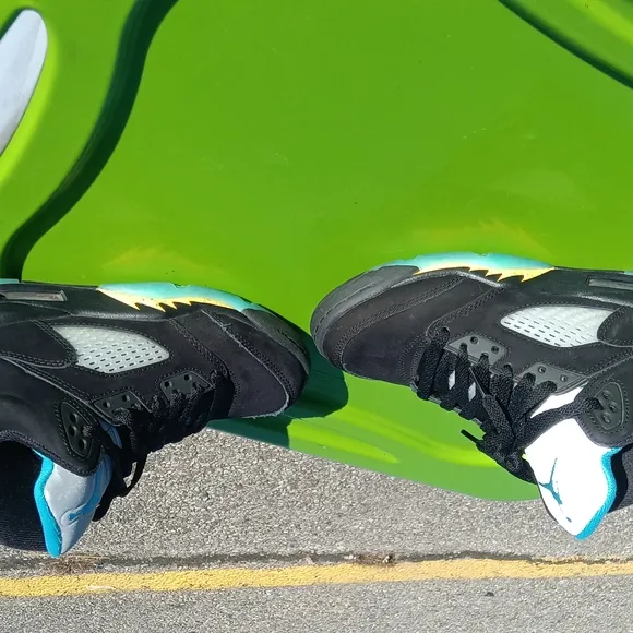 Black and Gray Sneakers with Teal Logo