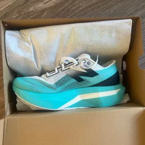 New Balance Aqua and Black Athletic Shoes