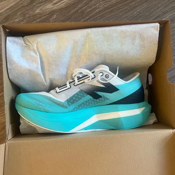 New Balance Aqua and Black Athletic Shoes