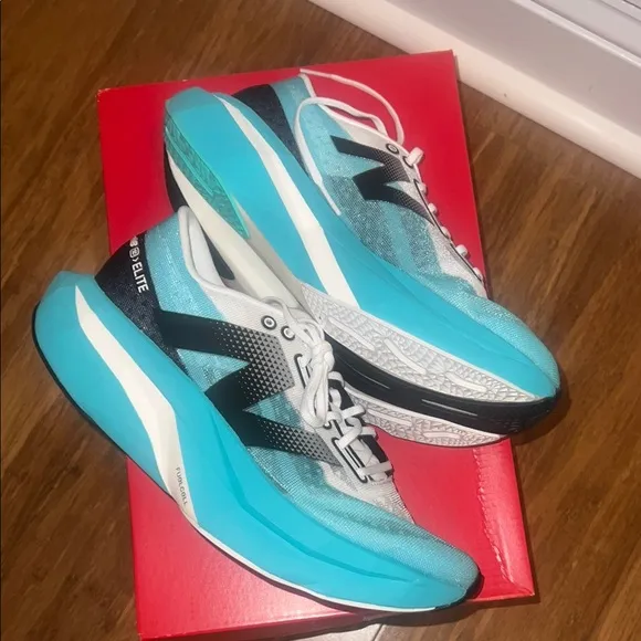 New Balance Women's SC Elite V4 Blue and Black Running Shoes