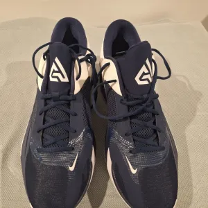 Nike Blue and White Athletic Shoes with Cushioned Midsole