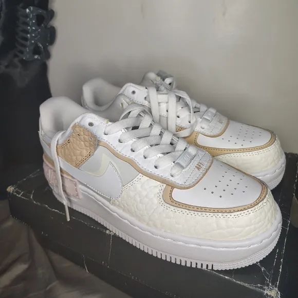 Nike White and Tan Athletic Shoes with Iconic Air Force 1 Design