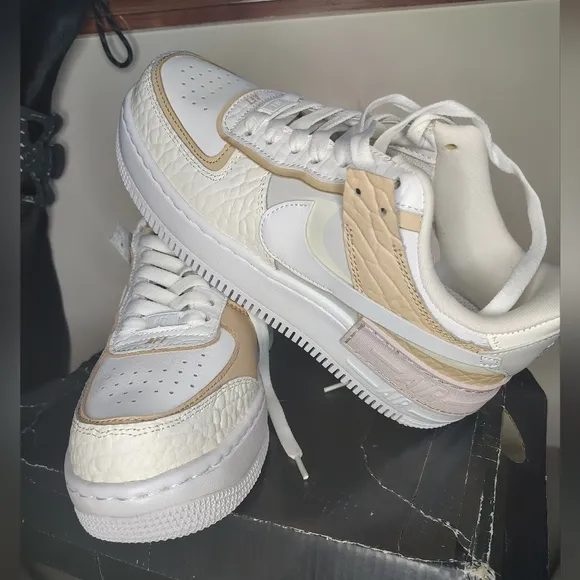 Nike White and Tan Athletic Shoes with Iconic Air Force 1 Design