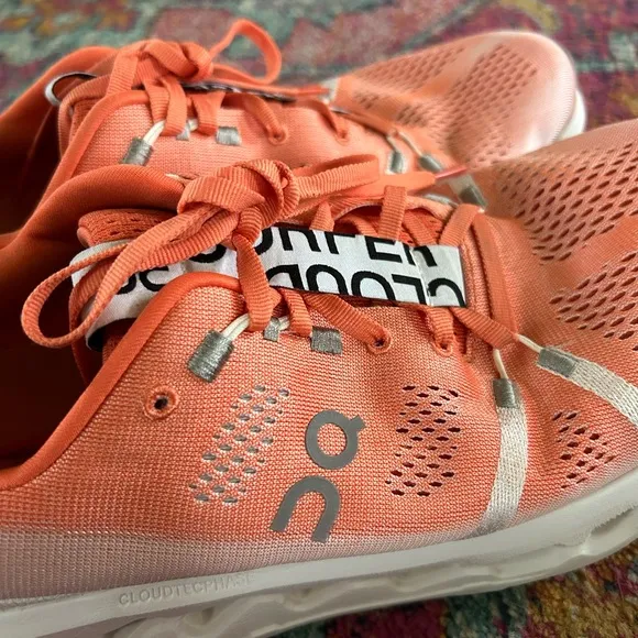 On Running | Men’s orange/white ‘Flame’ Cloudsurfer sneakers orange laces, 11.5